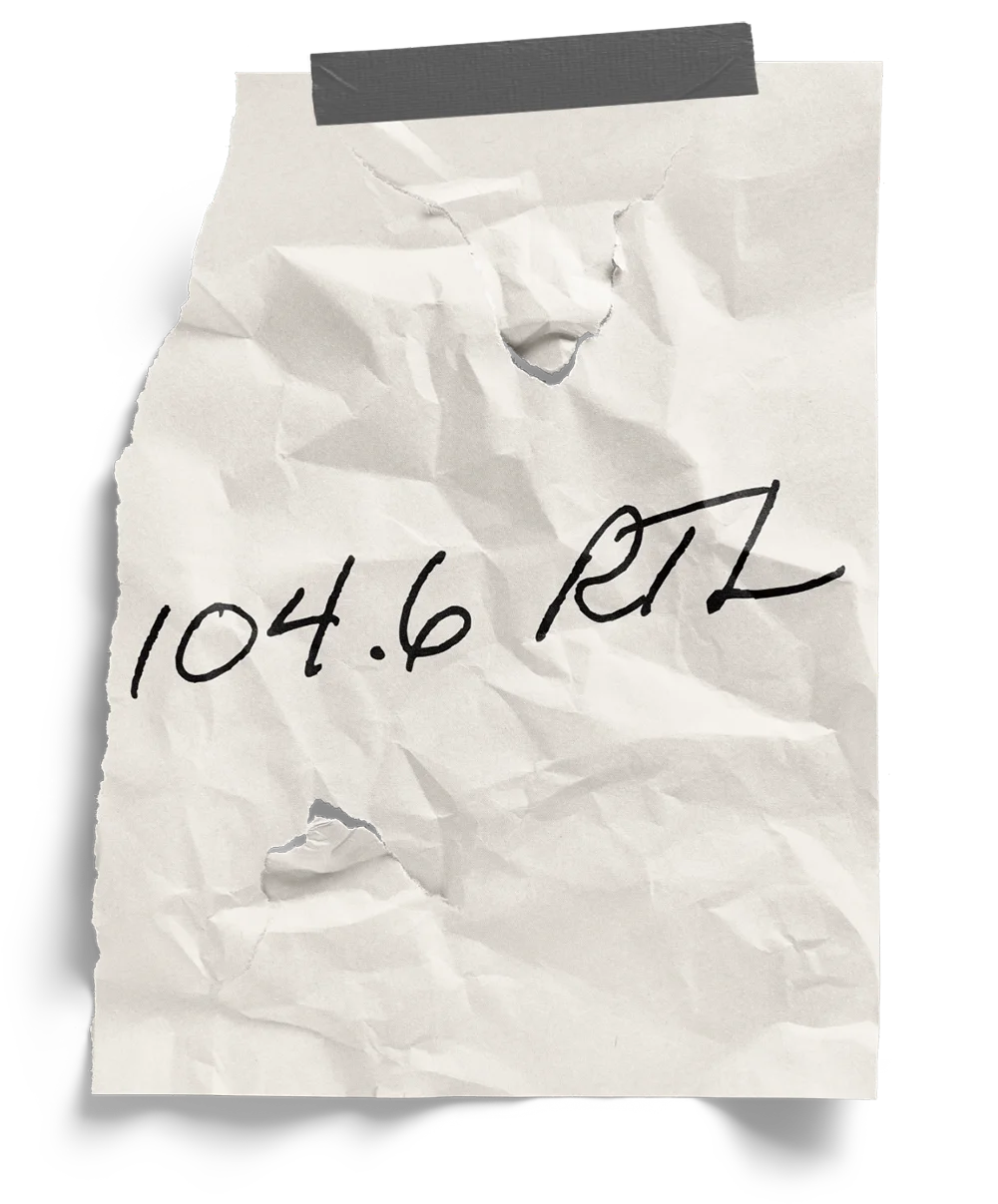 Crumpled note with 104.6 RTL written on it